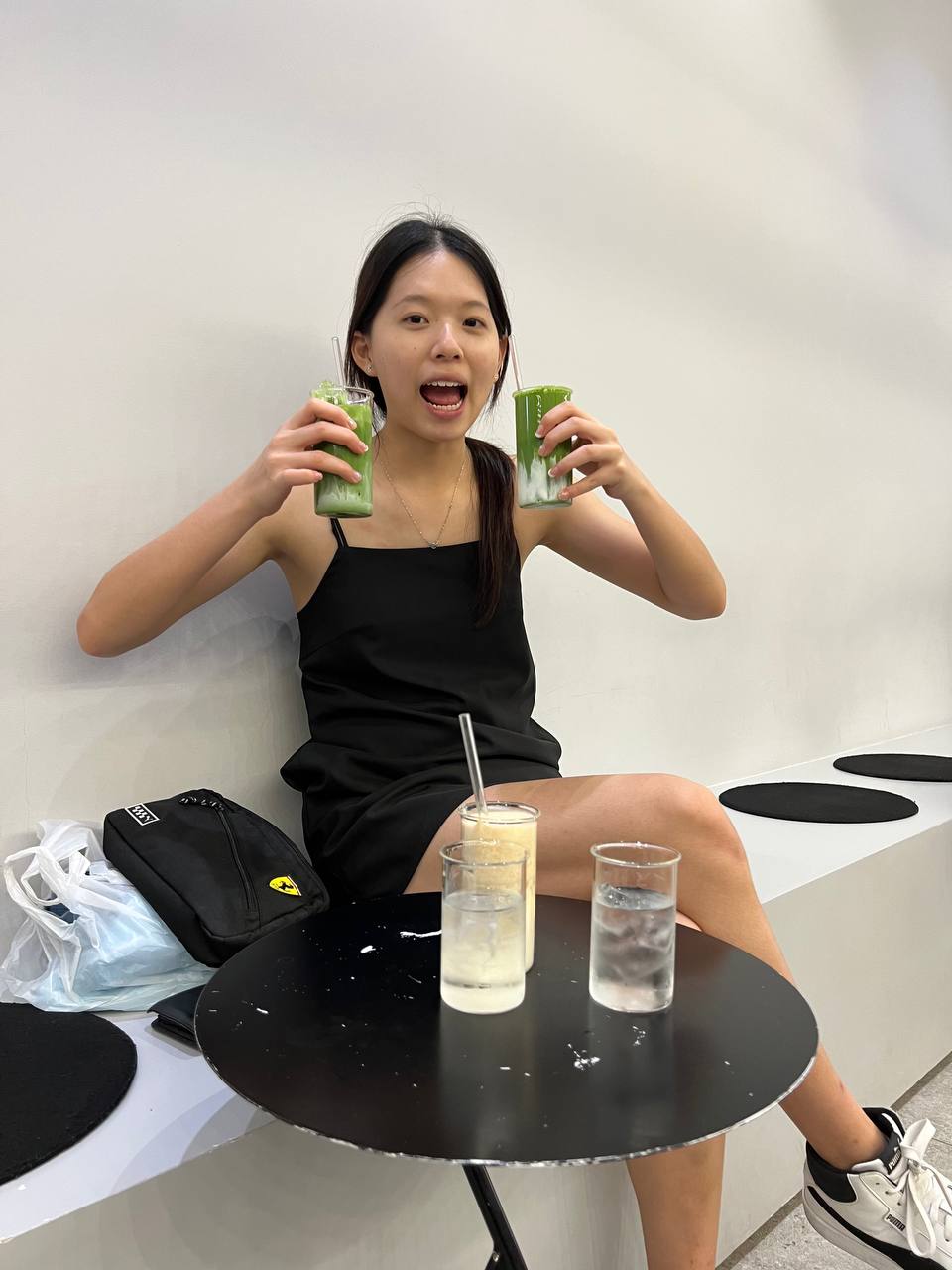 girl holding matcha